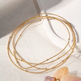 Pulseira/Colar Corda de Violão Bolinhas e Fecho Imã
