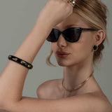 Bracelete Resina Black Detalhes Dourados