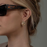 Brinco Nó Texturizado com Zircônias