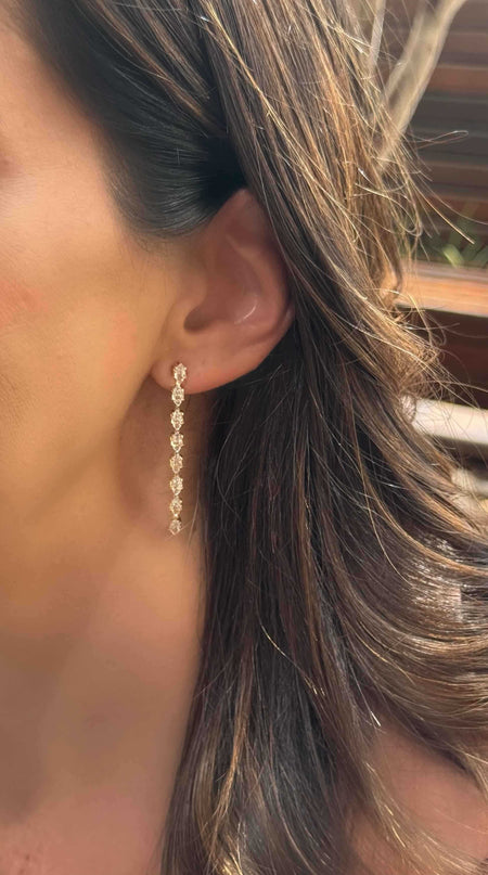Brinco fio e navetes com zirconias em o ouro 18k