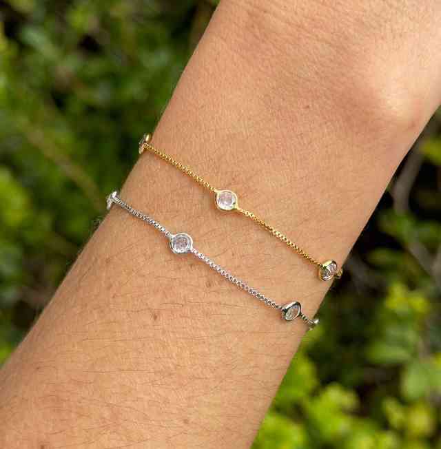 Pulseira ajustável pontos de luz com zircônia em banho de ouro 18k