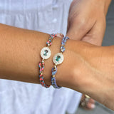 Pulseira fios de seda rosa com pingente cristal cravejado
